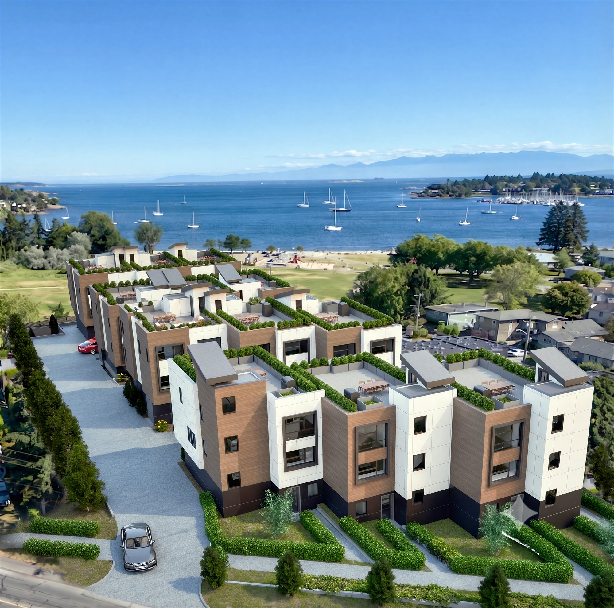 Aerial view of The Daisy townhomes overlooking Cadboro Bay